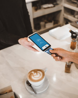 Person using card chip to make a payment