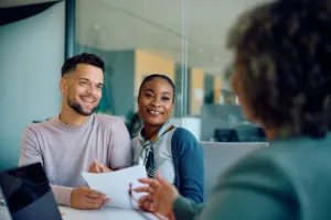 Young couple talking with a professional