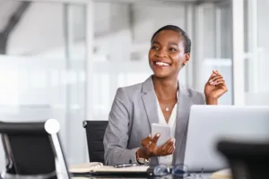 Smiling professional at her desk