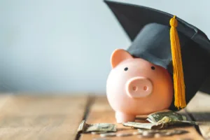 Piggy bank with graduation cap