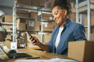 Business woman in room with packages